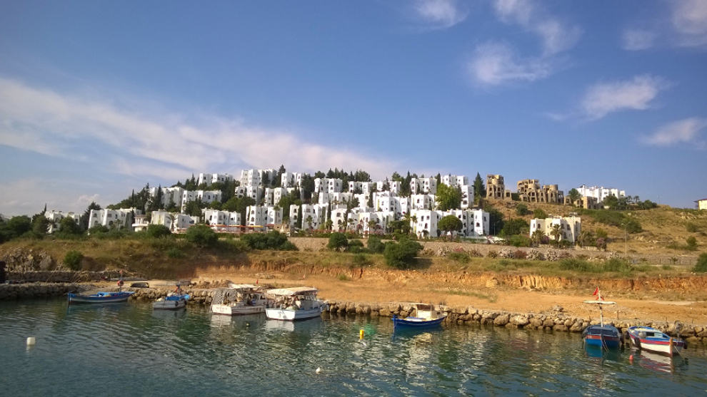 A small harbor with fishing boats in Turkey by Foxi77